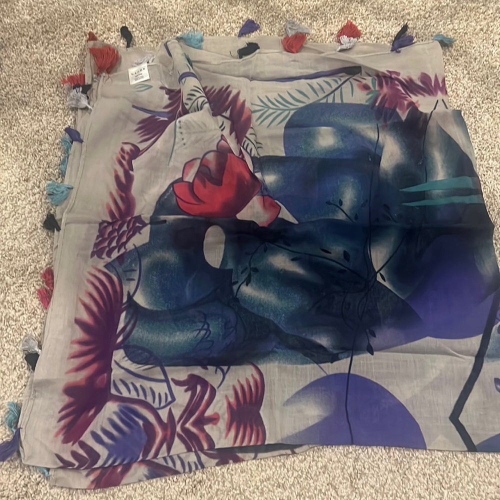 Gently used floral scarf with tassel details